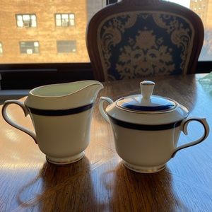 Creamer and sugar bowl with lid